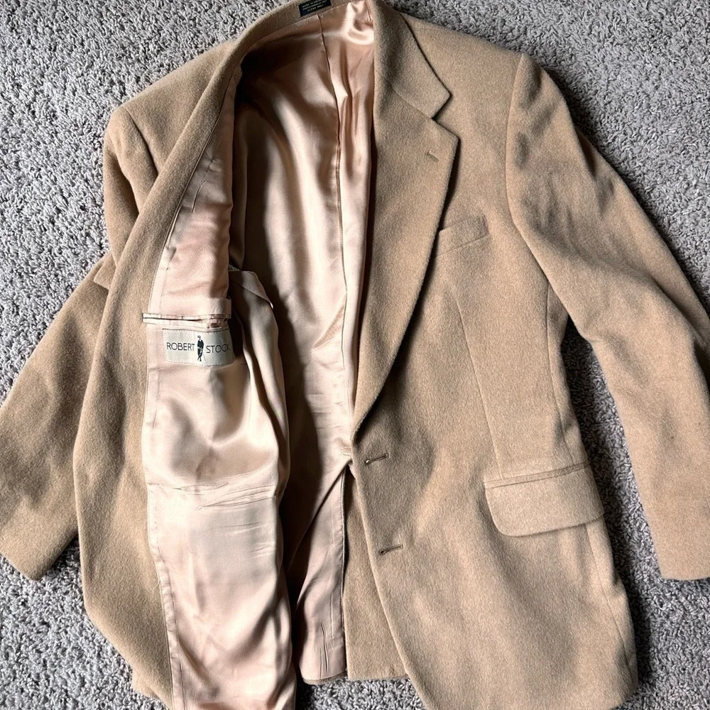 Brand: Robert Stock Tan blazer with a 2 button closure, 2 front pockets.